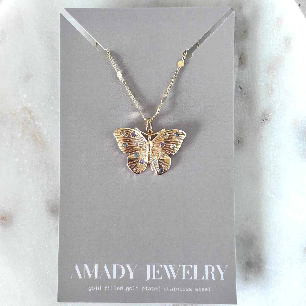 Butterfly necklace colorful crystals on it water resistant